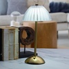 image:imageMikasa Acrylic and Metal Rechargeable Cordless LED Lamp with Clear Shade 59x59x11 InchGold Dome Shade
